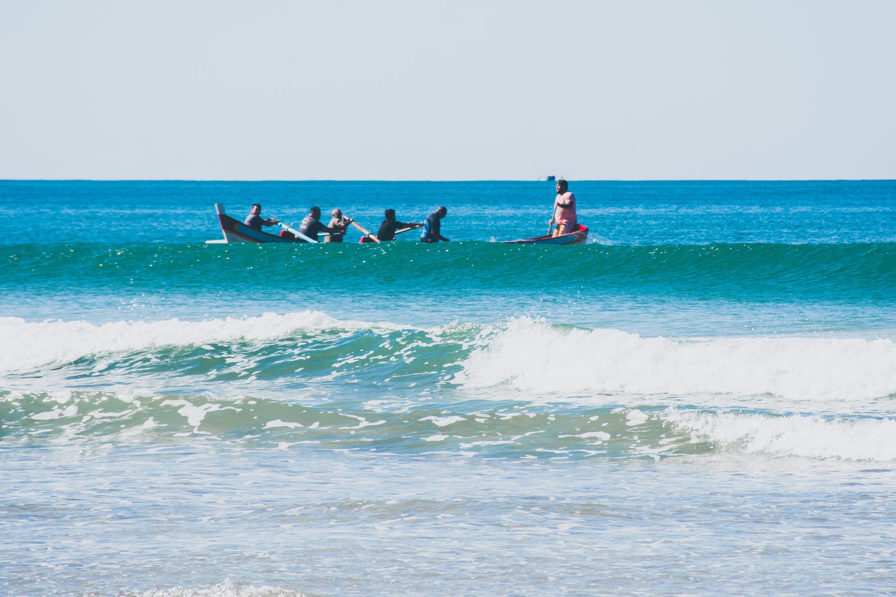 Boat just beyond the breakers