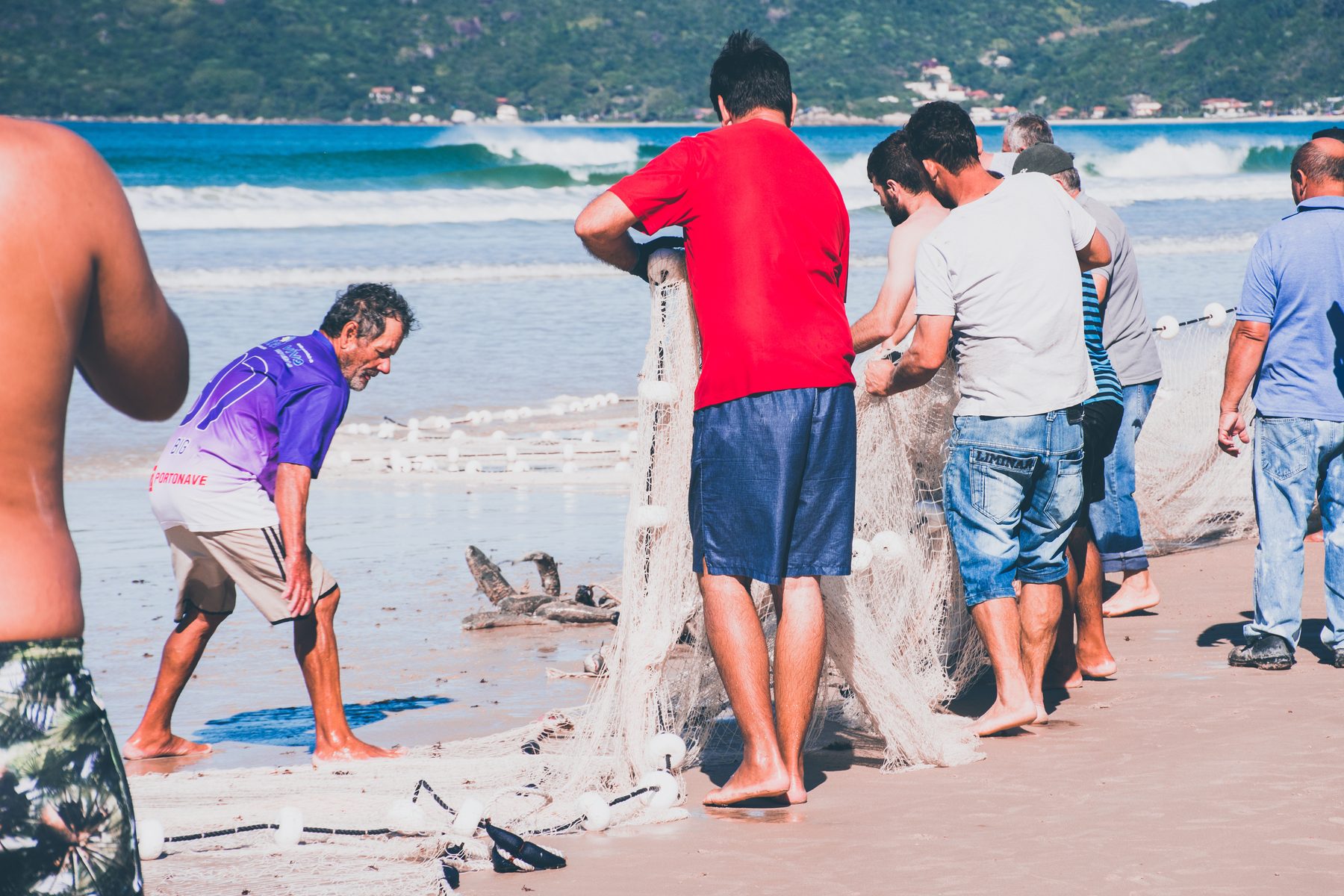 Boat driving through dramatic spray